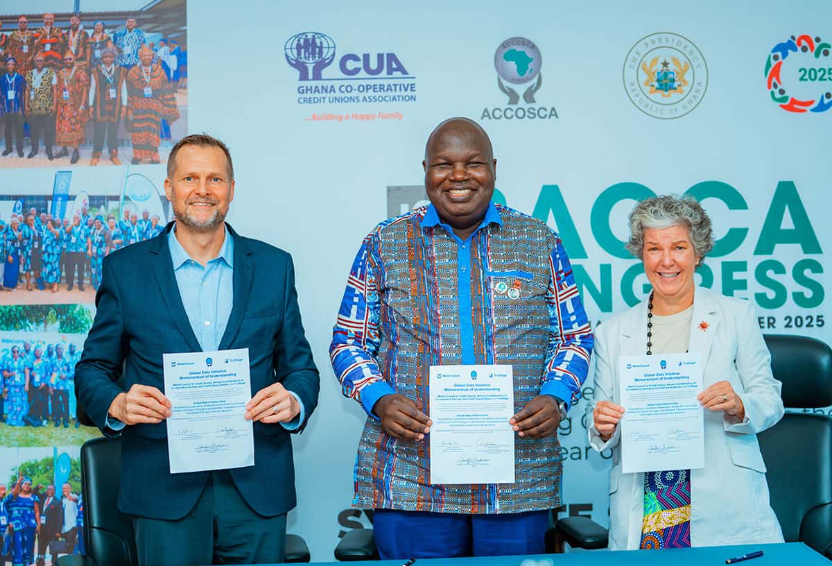 ACCOSCA Global data initiative showing three representatives each holding a document.
