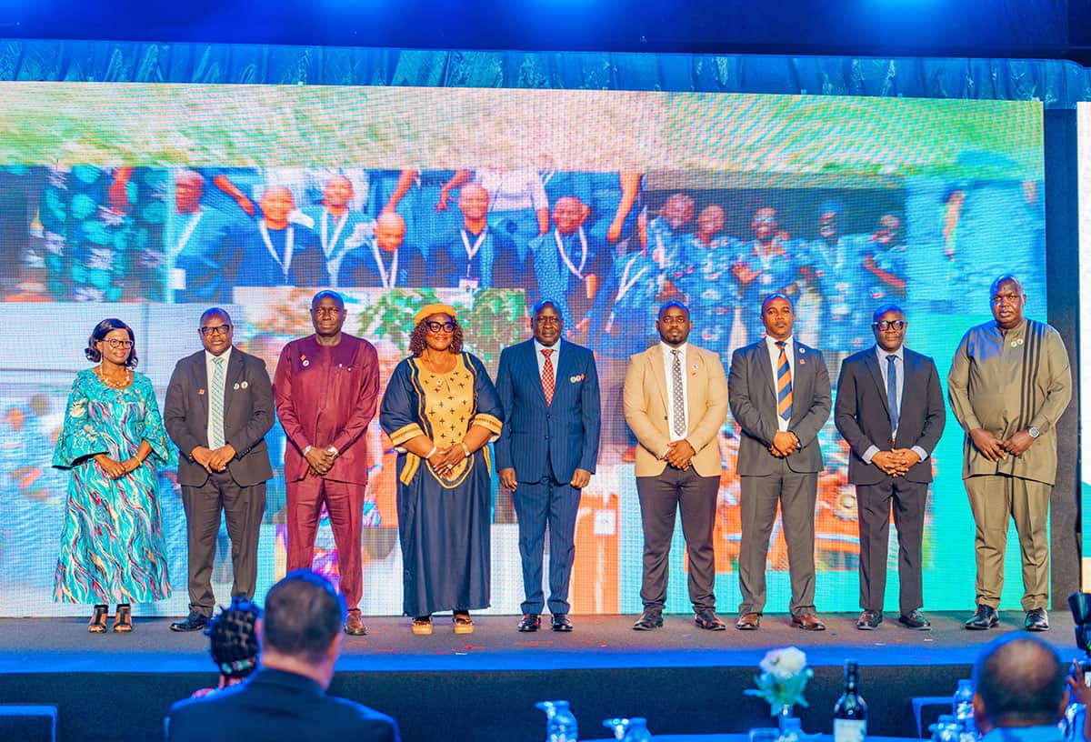 ACCOSCA Leaders standing on stage.